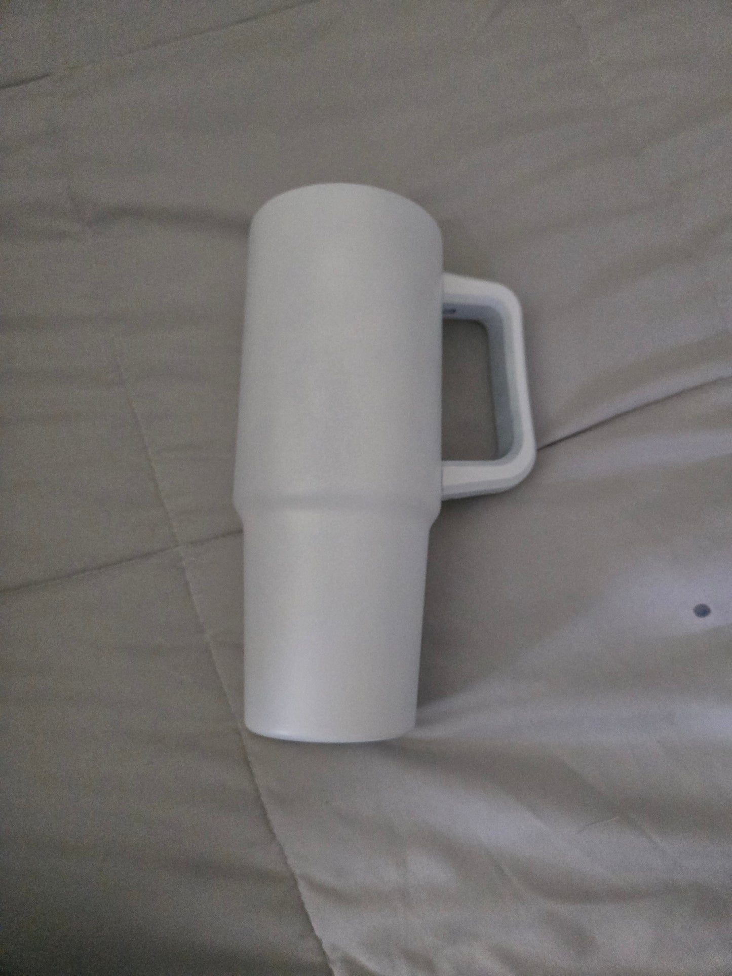 30 oz handle by hogg have white base and a black base